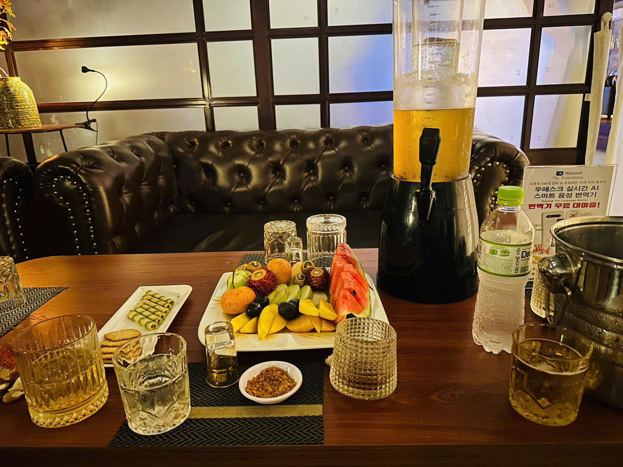 Fruit platter and beer tower table service at Boss Bar Lounge Da Nang
